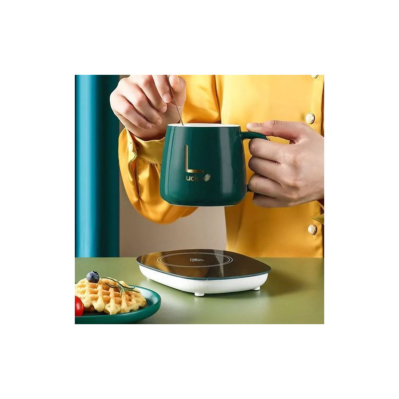 Mug with spoon and electric ceramic heater